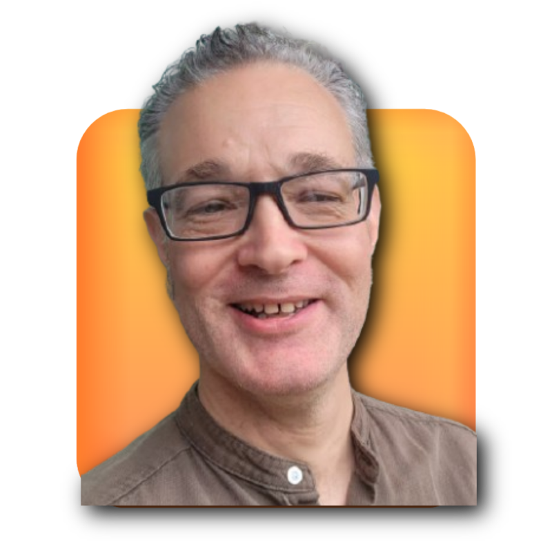Andrew Gibson, creator of EZC Emoji Composer, smiling in front of an orange background